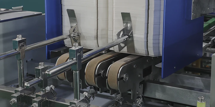 Paper product forming machine in operation